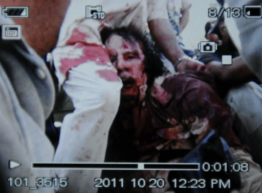 Муамар Каддафи умер от ранений